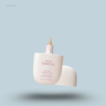 Kylie Cosmetics Skin Tint Blurring Elixir Foundation 30ml bottle on blue background — LBK India