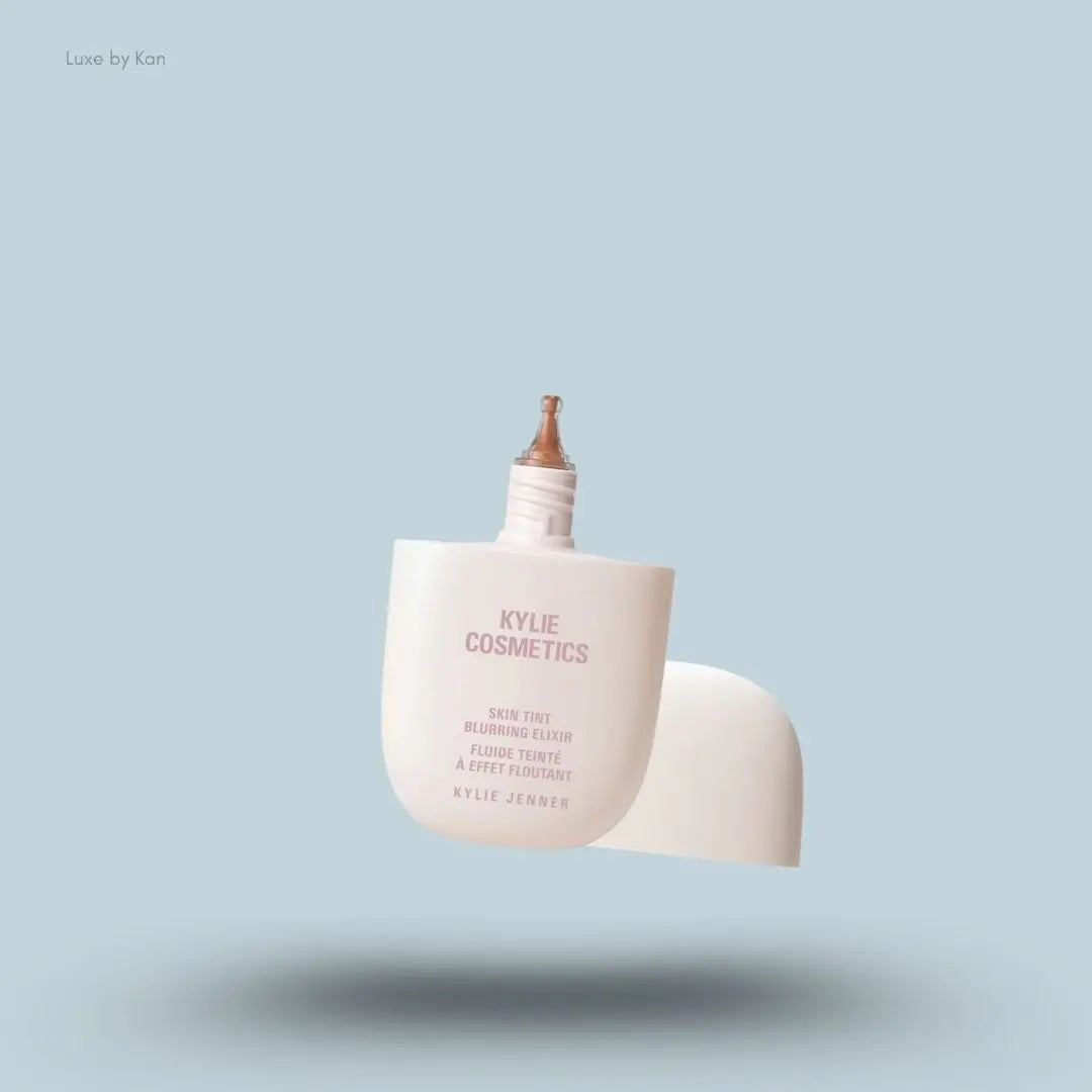 Kylie Cosmetics Skin Tint Blurring Elixir Foundation 30ml bottle on blue background — LBK India