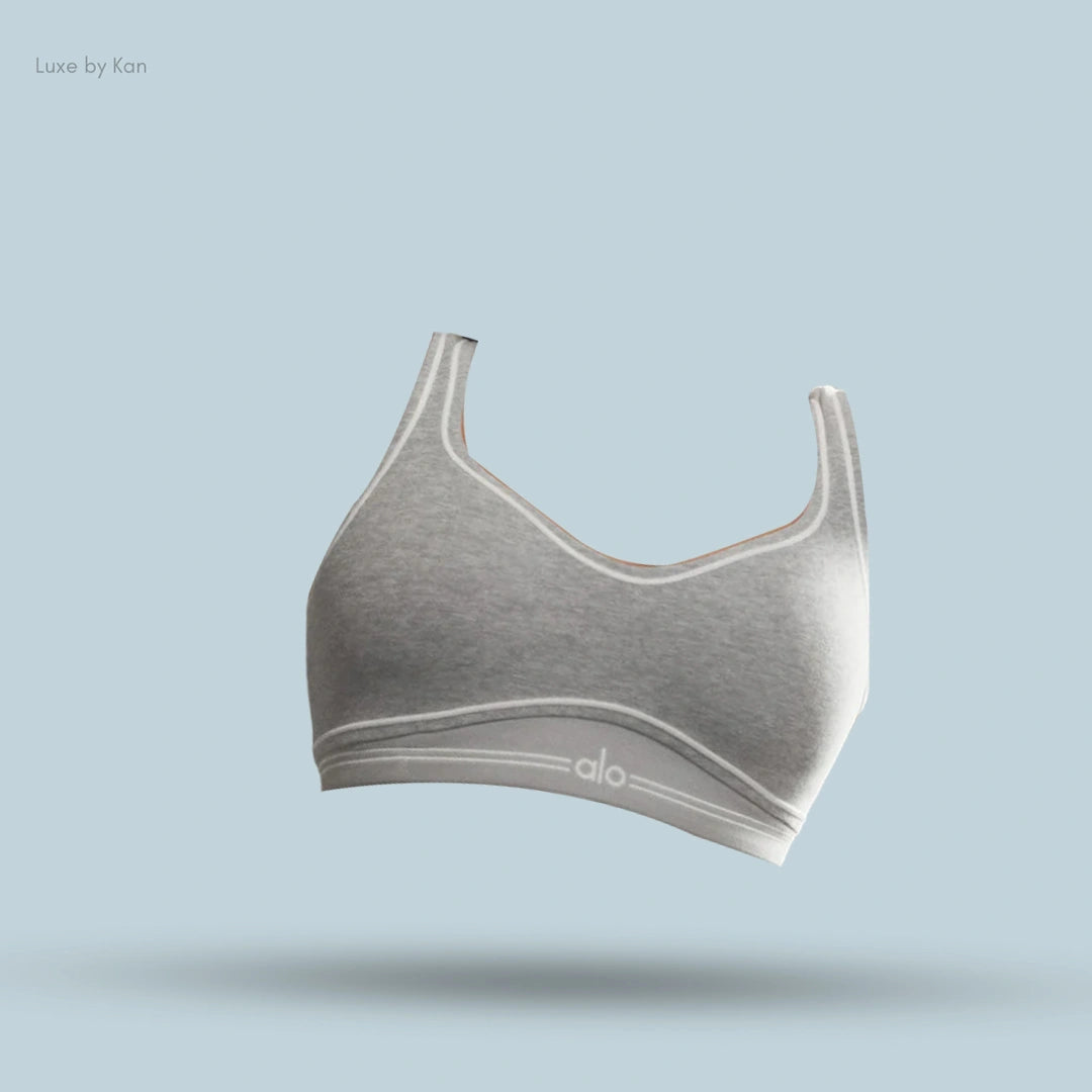 Gray Alo Alosoft Heart Throb Bra with thin white trim and Alo logo.