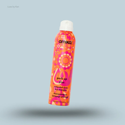 Amika Perk Up Plus Extended Clean Dry Shampoo 200ml bottle on blue background — LBK India