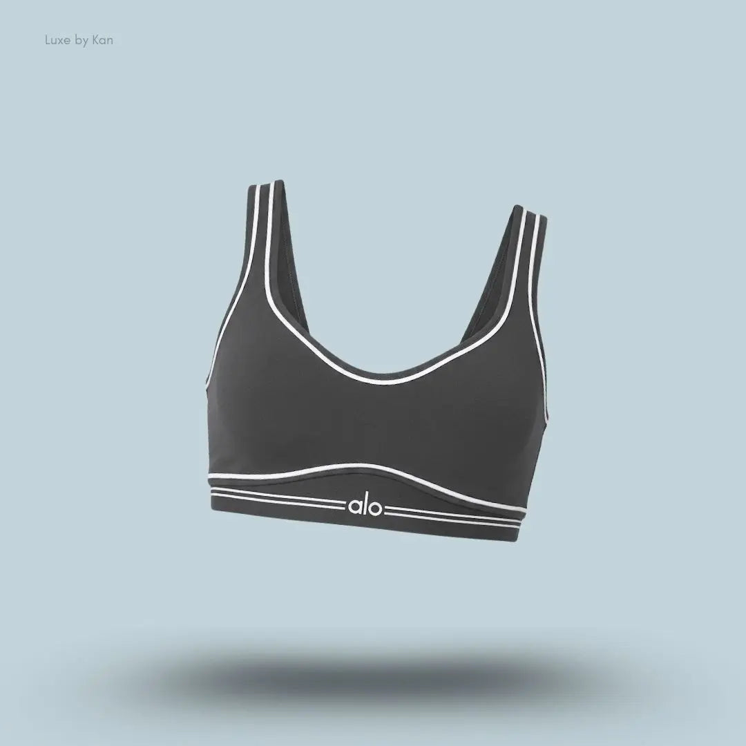 Alo Airbrush Heart Throb Bra in Anthracite/White, flat lay on light blue background