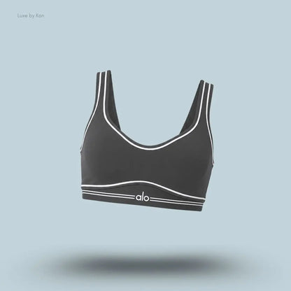 Alo Airbrush Heart Throb Bra in Anthracite/White, flat lay on light blue background