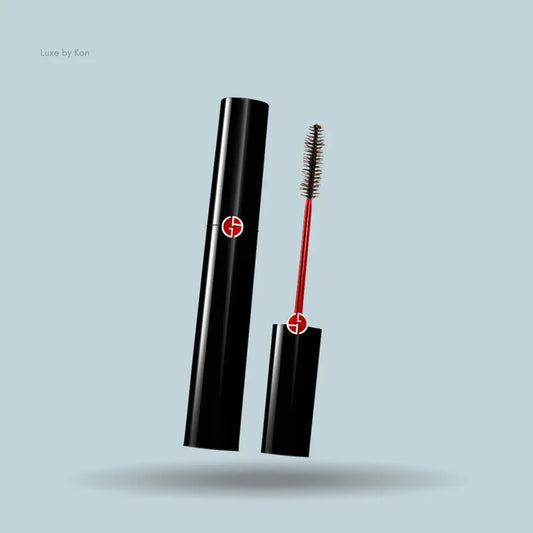 Armani Beauty Black Ecstasy Mascara black bottle with mascara applicator on blue background — LBK