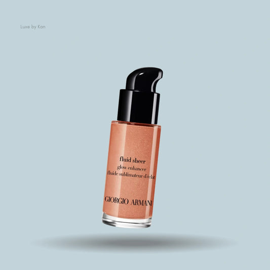 Armani fluid sheer liquid highlighter bottle with a black pump top.