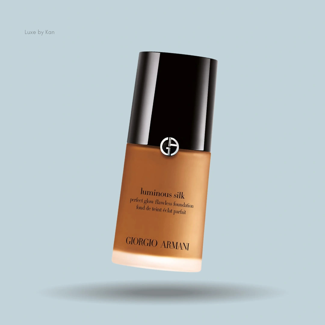 Armani Luminous Silk foundation bottle, featuring a bronze hue and a black cap.