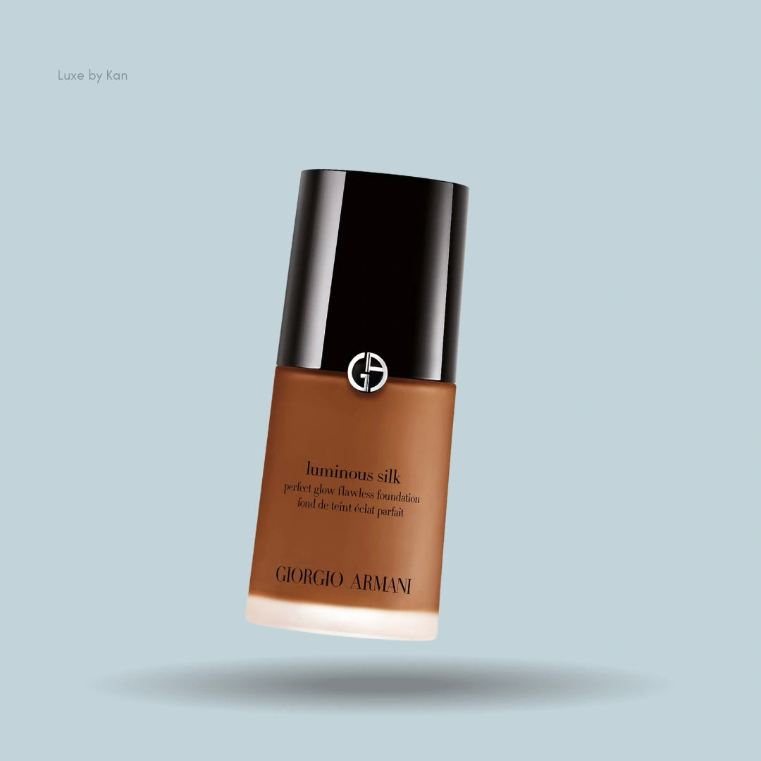 Giorgio Armani Luminous Silk foundation bottle with a black cap and warm brown base.