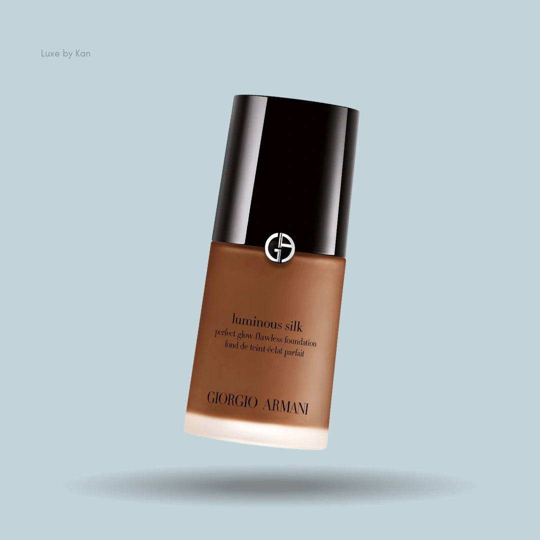Giorgio Armani Luminous Silk foundation bottle, brown liquid, black cap, silver logo.