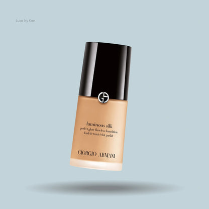 Armani Luminous Silk foundation bottle, tan liquid with black cap.