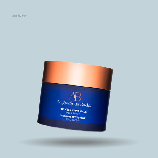 Augustinus Bader cleansing balm in blue jar with copper lid.