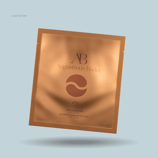Augustinus Bader Eye Patch in a single-use gold foil sachet.