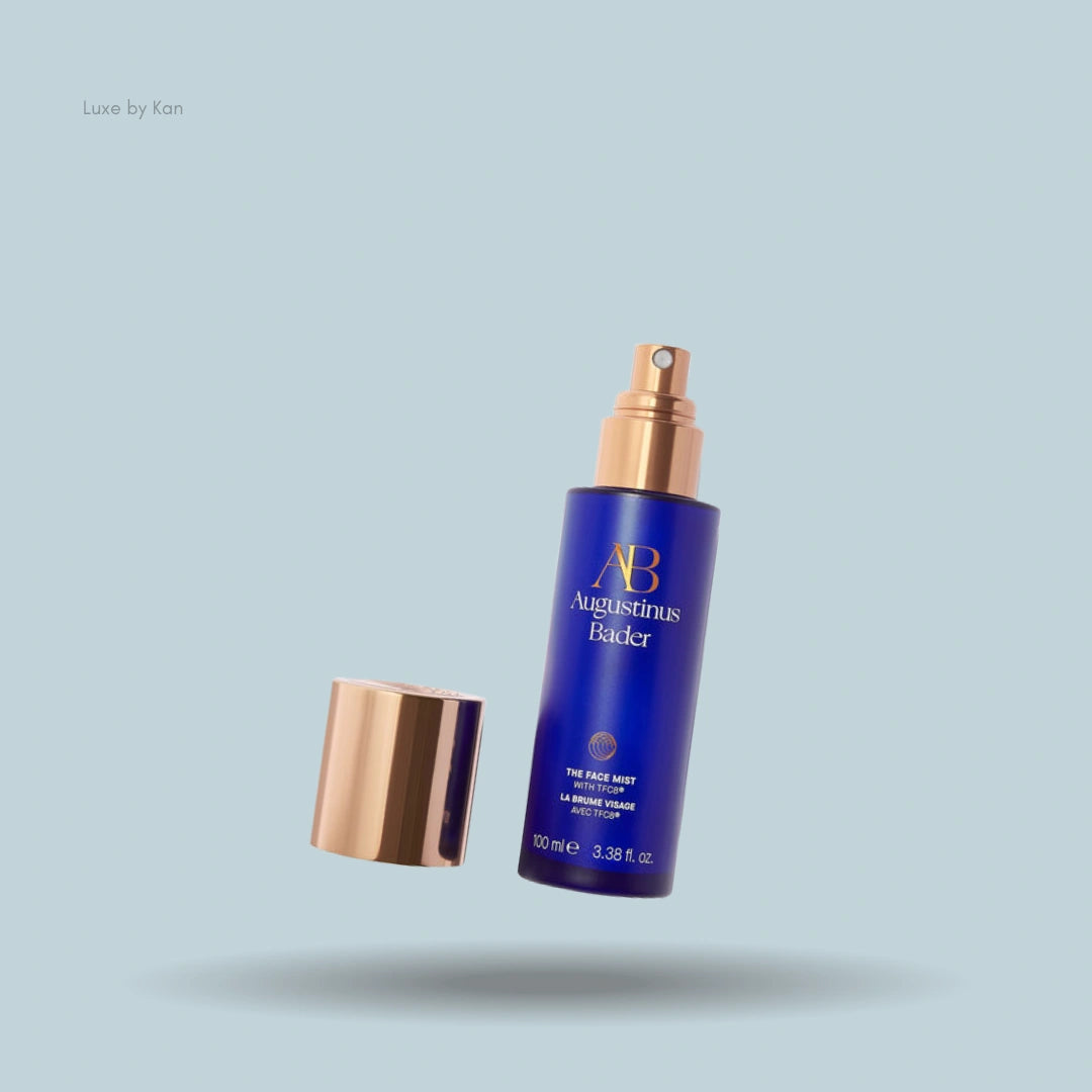 Augustinus Bader face mist spray bottle with detached cap.