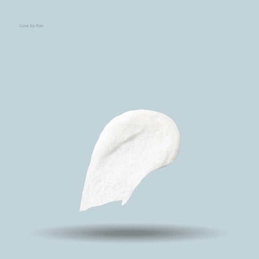 Swatch of white Augustinus Bader Foaming Cleanser.