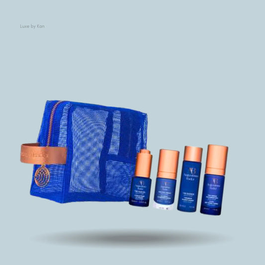 Augustinus Bader starter kit: blue bag and four skincare bottles.