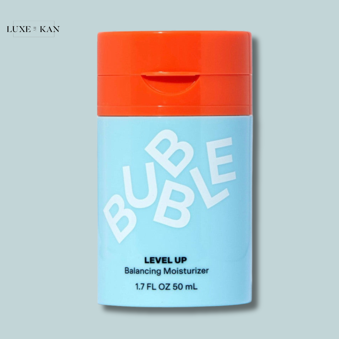 A light blue moisturizer container with an orange cap, labeled "BUBBLE LEVEL UP Balancing Moisturizer," 1.7 fl oz (50 mL).