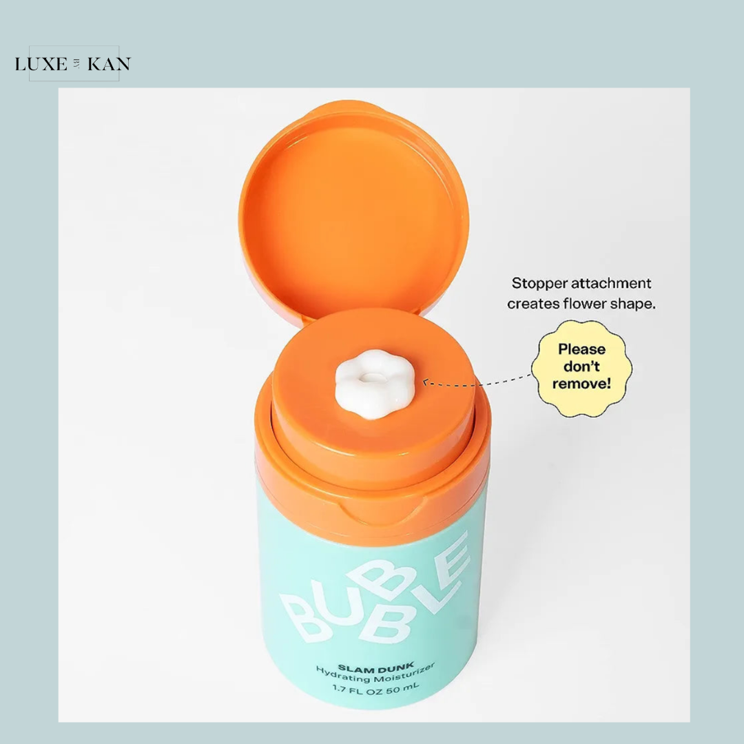 Open packaging of "Bubble Slam Dunk Hydrating Moisturizer," showcasing a flower-shaped stopper with a warning: "Please don't remove!"