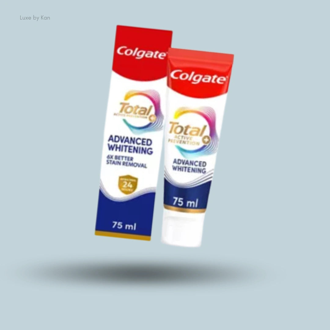 A tube and box of Colgate Total Advanced Whitening toothpaste floating over a shadow against a light blue background.