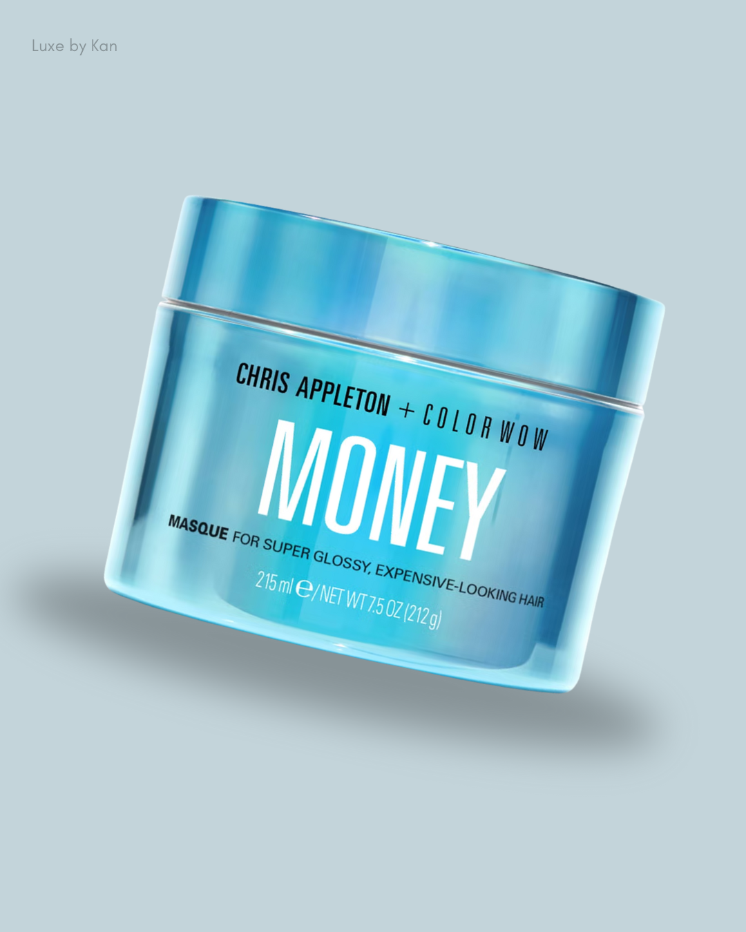 A blue jar labeled "MONEY" masque from Chris Appleton + Color Wow, designed for achieving super glossy, luxurious-looking hair.