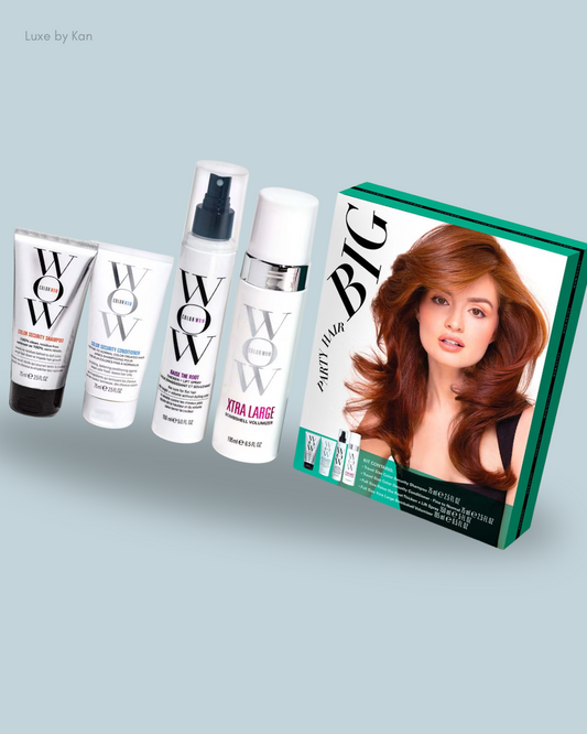 Four hair care products from Color Wow, including shampoo, conditioner, and volumizer, beside a colorful packaging design.