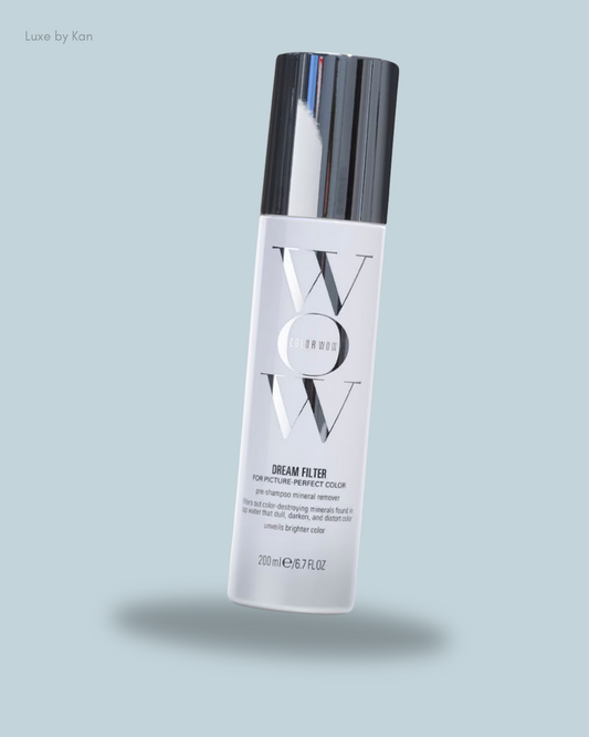 A bottle of Color Wow Dream Filter, a pre-shampoo mineral remover for vibrant hair color.