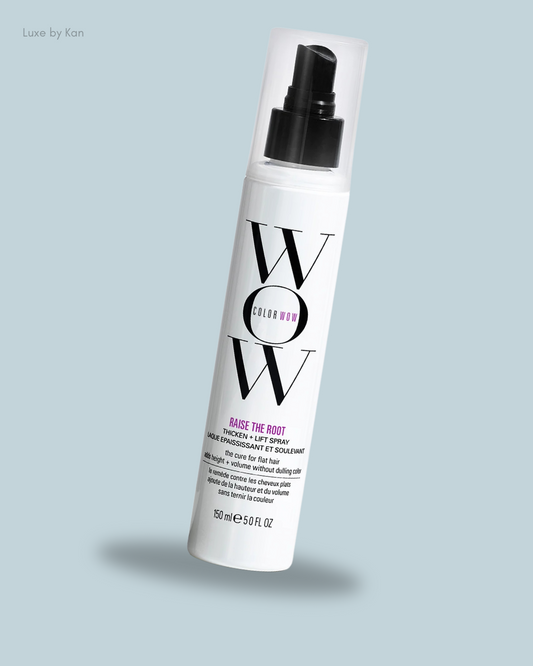 A bottle of Color Wow "Raise The Root" thickening and lifting spray, designed to add volume to flat hair.