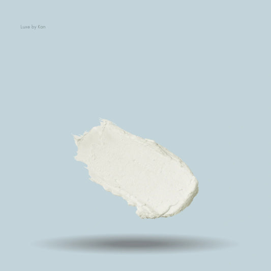 Textured swatch of Colorescience Sunforgettable Total Protection Sport Stick SPF 50 against a solid light blue background, casting a subtle shadow.