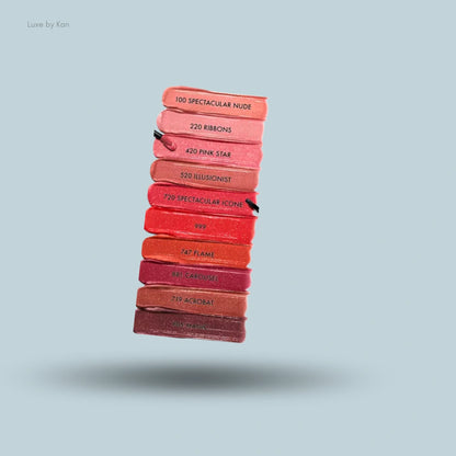 A stack of DIOR Rouge Dior Sequin Liquid Duo Limited Edition lip color swatches in various shades.