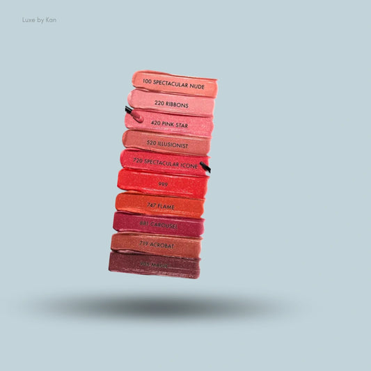 A stack of DIOR Rouge Dior Sequin Liquid Duo Limited Edition lip color swatches in various shades.