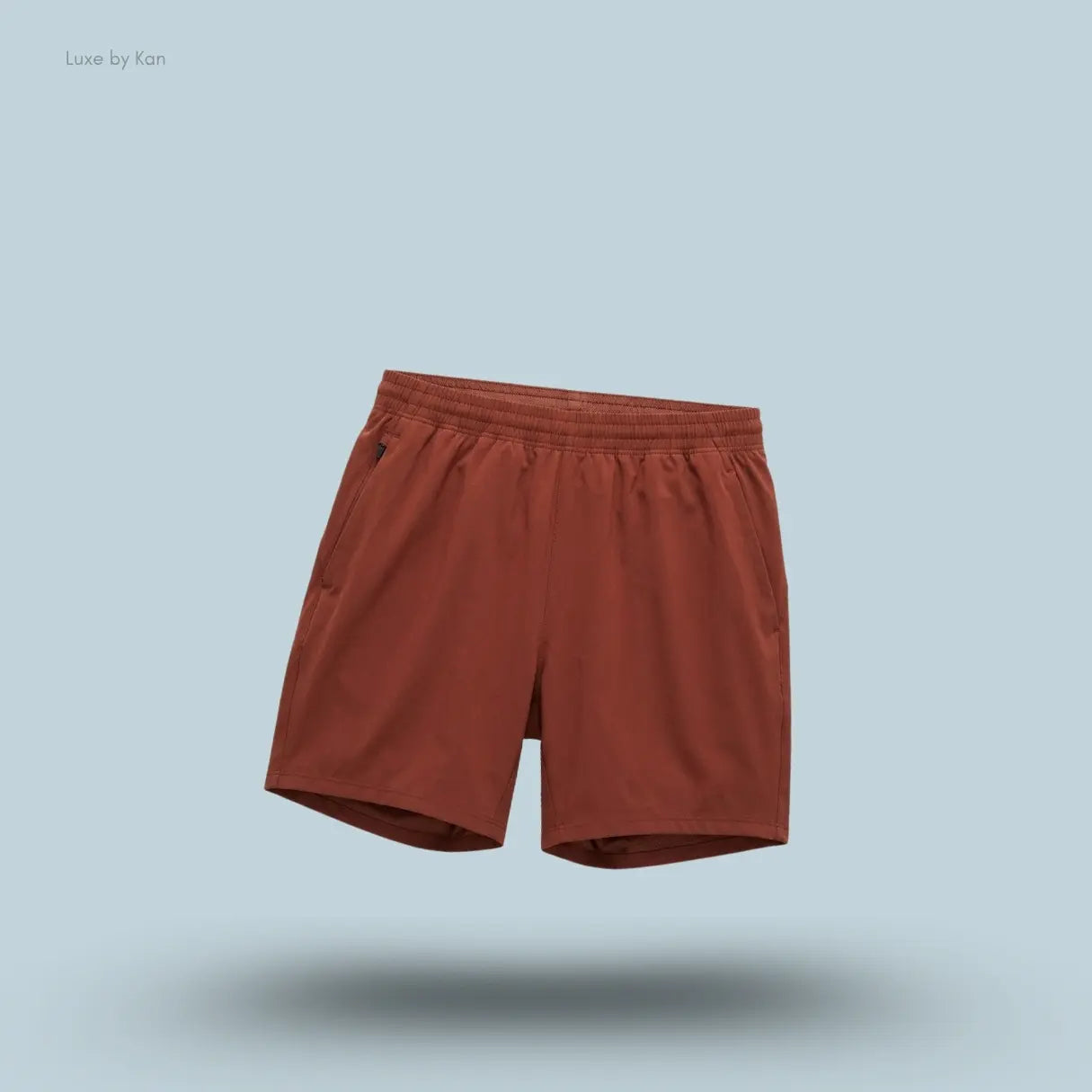 Lululemon Pace Breaker Linerless Short 7" in cranberry charm, front view on light blue background