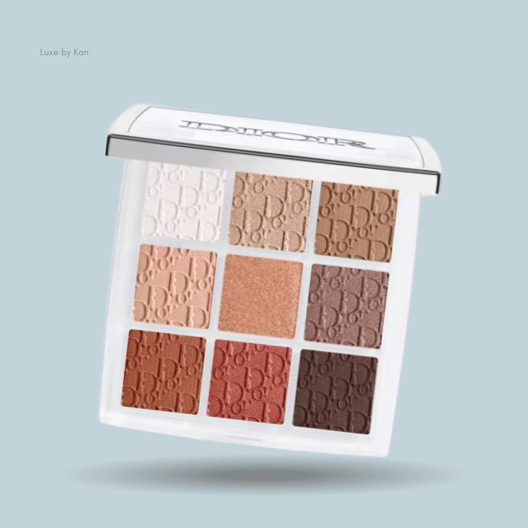Dior backstage eyeshadow palette featuring nine square-pan eyeshadows in a range of neutral tones, embossed with the Dior logo, encased in a white compact.