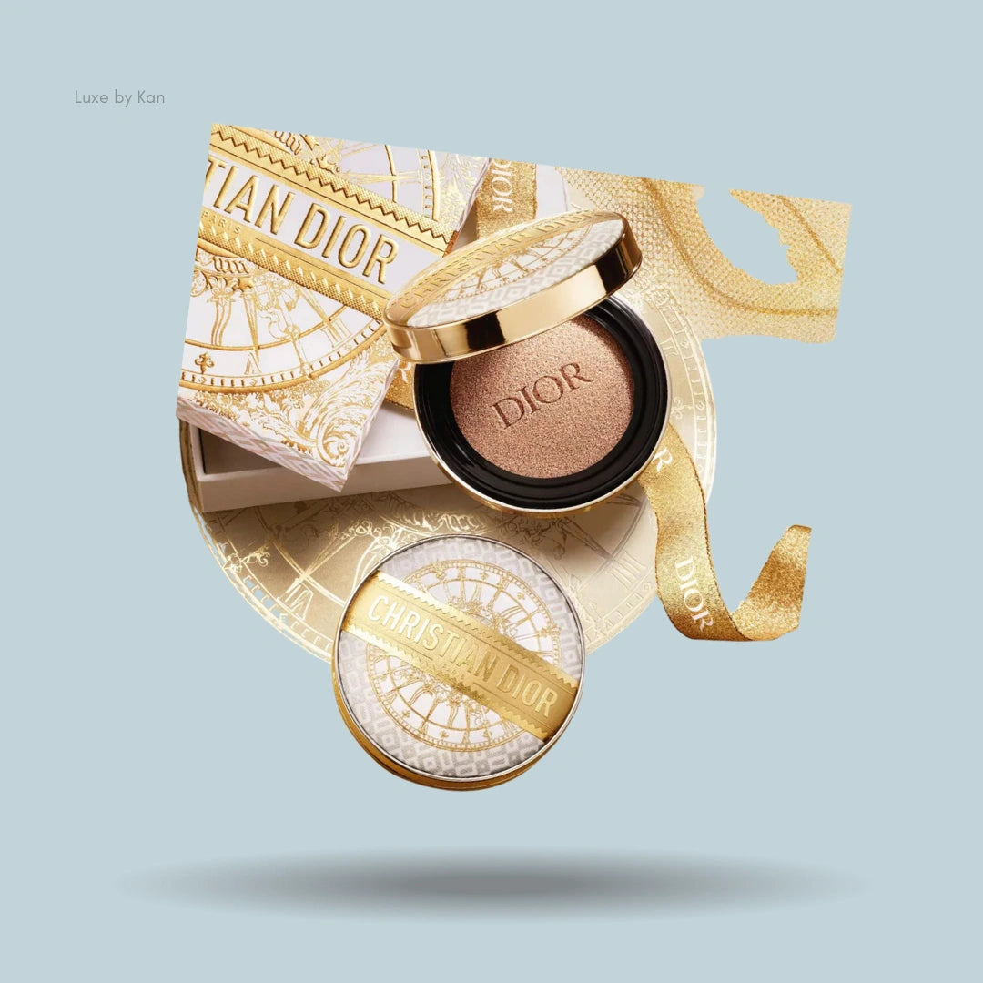 Dior Forever Couture Perfect Cushion foundation case, open to display the cushion, with outer packaging, ribbon and a compact.