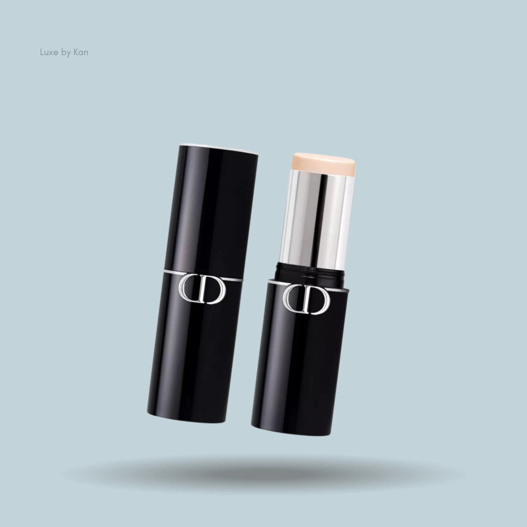 Two Dior Forever Foundation Sticks, one shown open and the other closed.