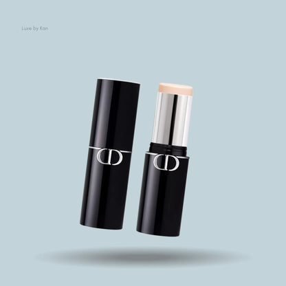 Two Dior Forever Foundation Sticks, one shown open and the other closed.