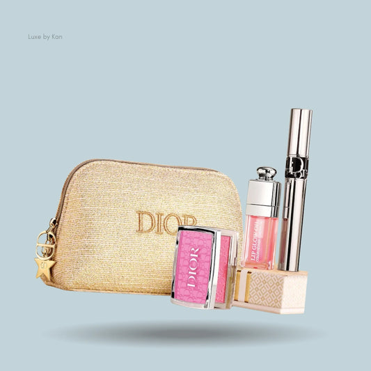 Dior "Volume & Natural Glow" Ritual Gift Set featuring a gold makeup bag, blush, lip oil, and mascara.
