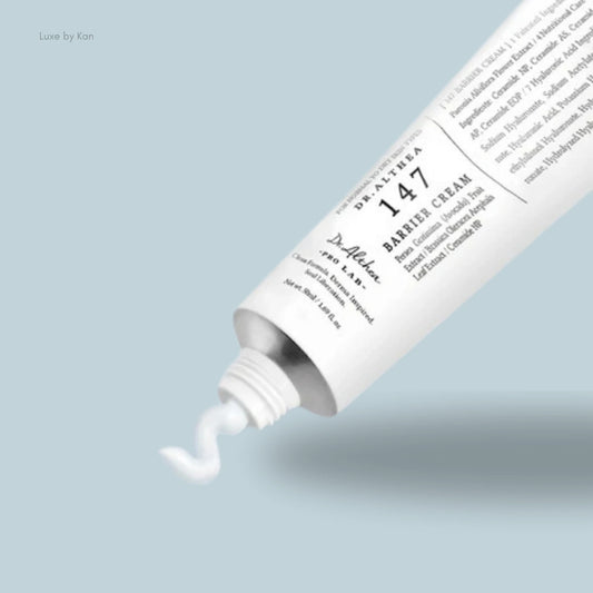 Dr. Althea 147 barrier cream tube with cream being extruded from the opening.