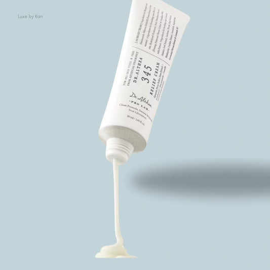 Dr. Althea 345 relief cream tube with cream product flowing from the opening.