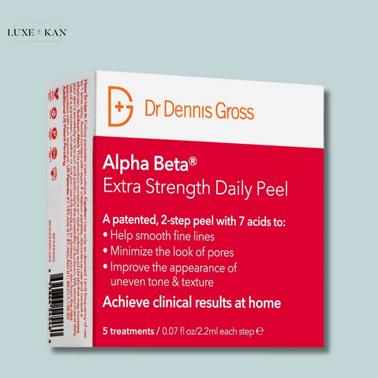 Box of Dr. Dennis Gross Alpha Beta Extra Strength Daily Peel, highlighting benefits like fine line reduction and improved skin texture.