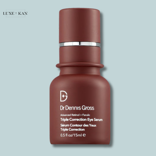 Dr. Dennis Gross' Advanced Retinol + Ferulic Triple Correction Eye Serum in a small brown bottle.