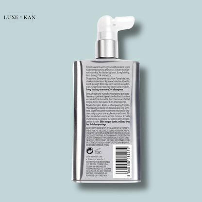 Color wow dream coat supernatural spray bottle with a pump, featuring usage directions and ingredient list.