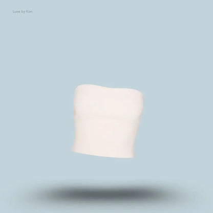 SKIMS Refined Knit Tube Top in Egret, flat lay on light blue background