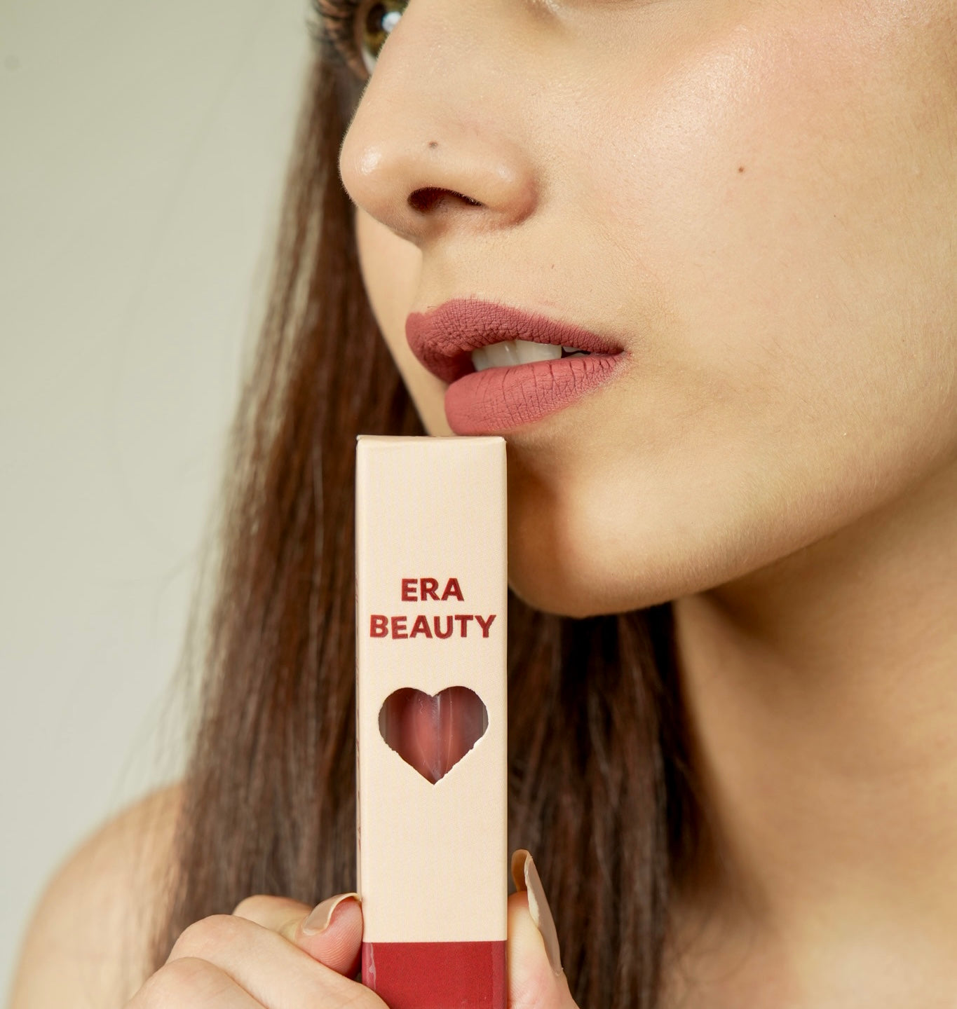 A person holds a era beauty product.
