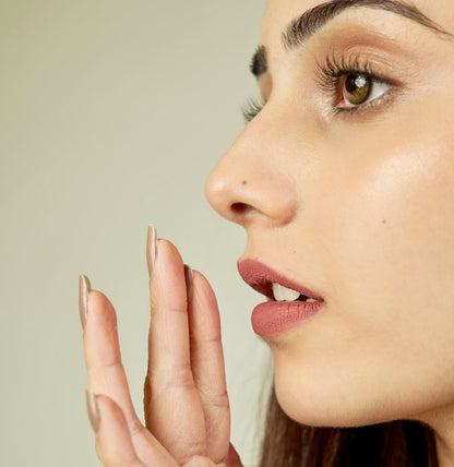 A close-up of a era beauty matte lipstick