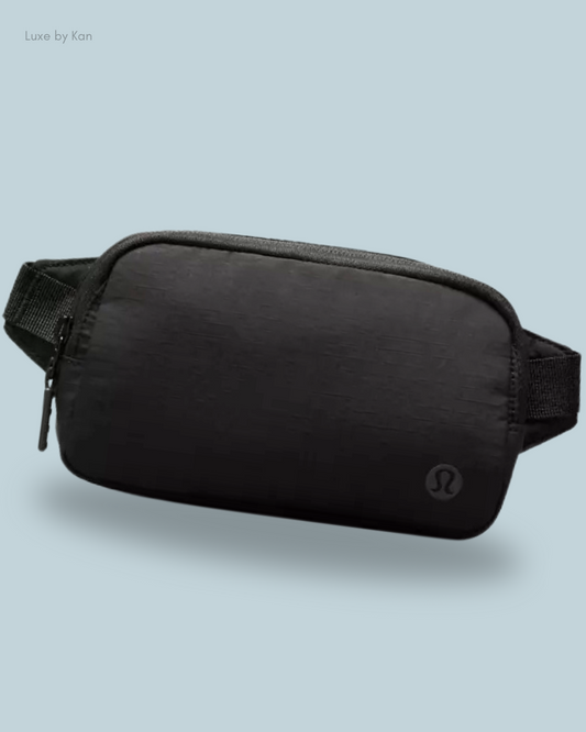 Black Lululemon Everywhere Belt Bag Mini Ripstop featuring a sleek design, zip closure, and side logo detailing.