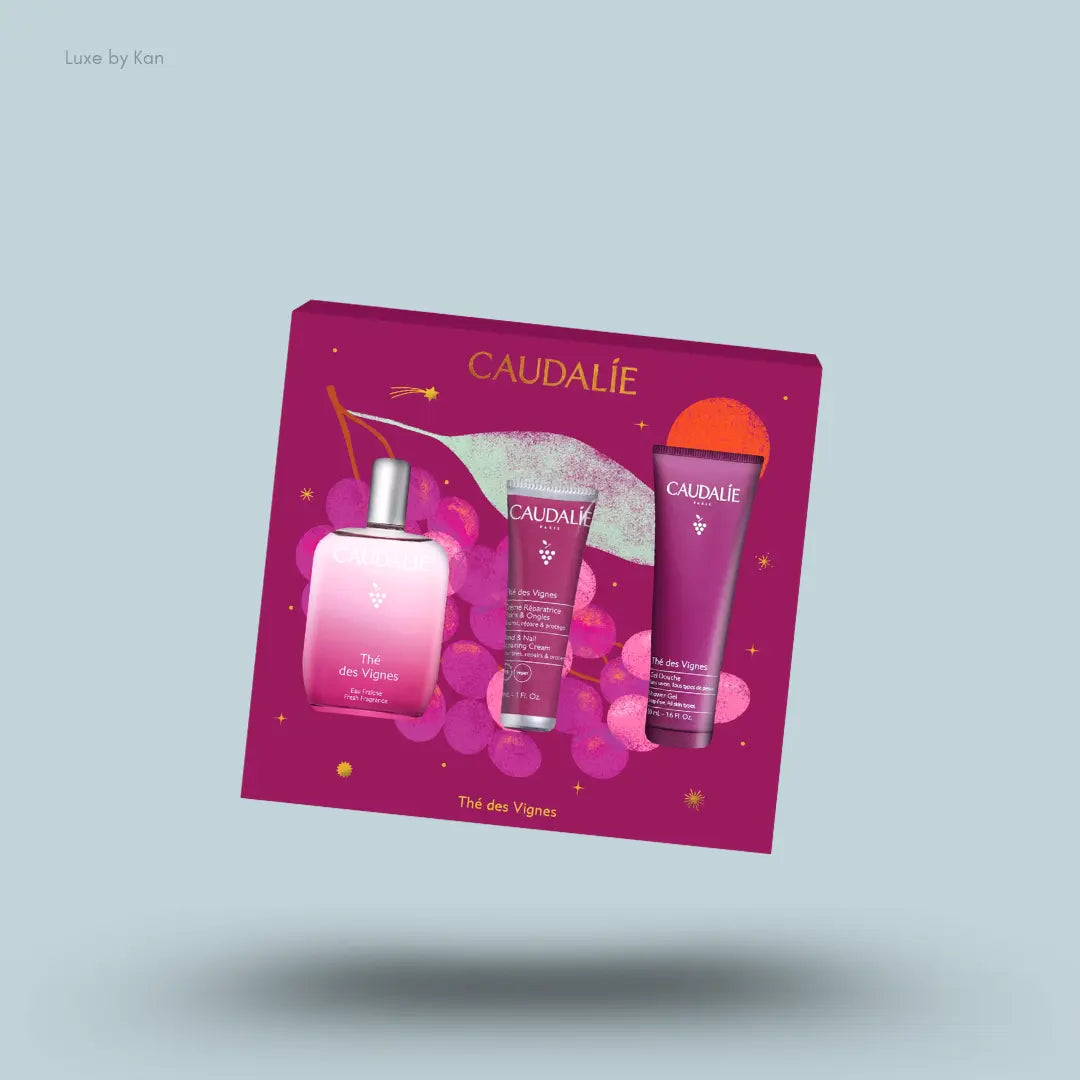 Caudalie Thé des Vignes Fragrance & Body Care Gift Set three products with packaging on blue background