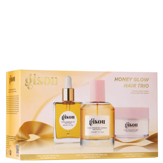 Gisou's Honey Glow Hair Trio, including hair oil, hair perfume, and hair mask.