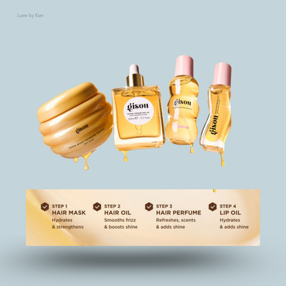 Four honey-toned Gisou Get all the Way hair and lip products float above a four-step beauty routine guide.