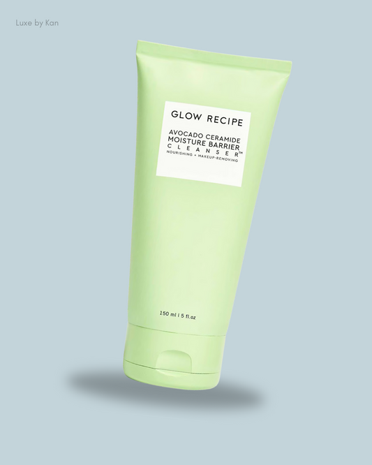 A light green tube of Glow Recipe Avocado Ceramide Moisture Barrier Cleanser, labeled as nourishing and makeup-removing.