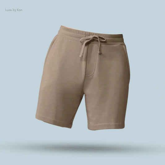 Alo Chill Short in Gravel, flat lay on light blue background