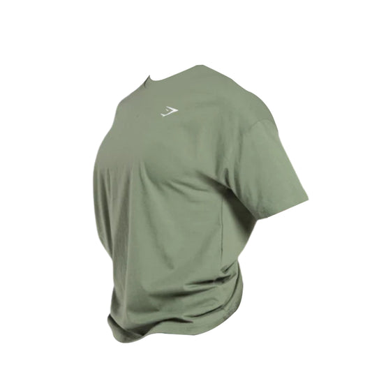 Olive green Gymshark Adapt Camo Graphic Oversized Top featuring a minimal logo on the chest.