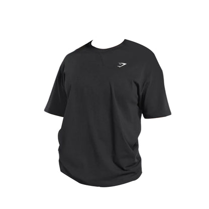 Black Gymshark short-sleeve T-shirt with a subtle chest logo, designed for a relaxed fit and all-day comfort.