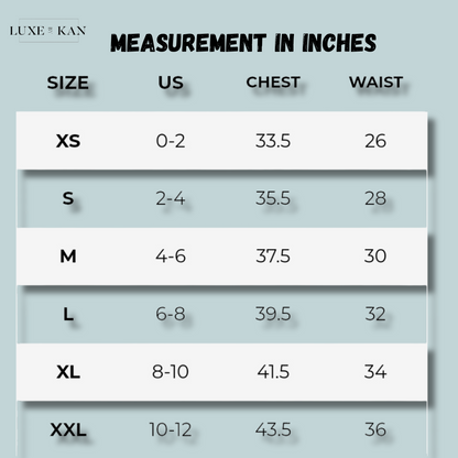 Gymshark size chart displaying US sizes and corresponding chest and waist measurements in inches from XS to XXL.